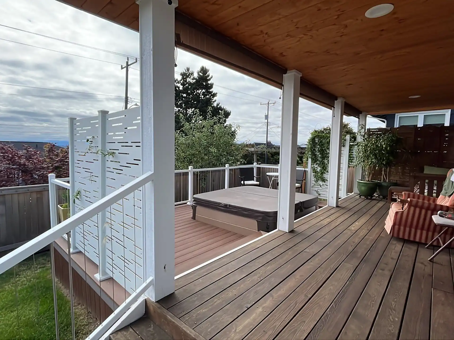 multi-level deck with a hot tub