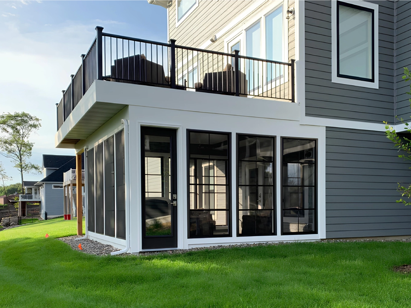 custom-screen-porch-under-deck-with-outdoor-furniture-in-seattle-wa