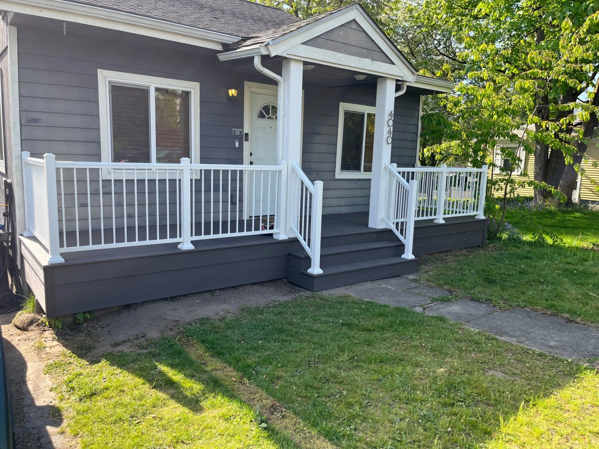 residential-deck-with-portico-and-white-deck-railing-in-seattle-wa