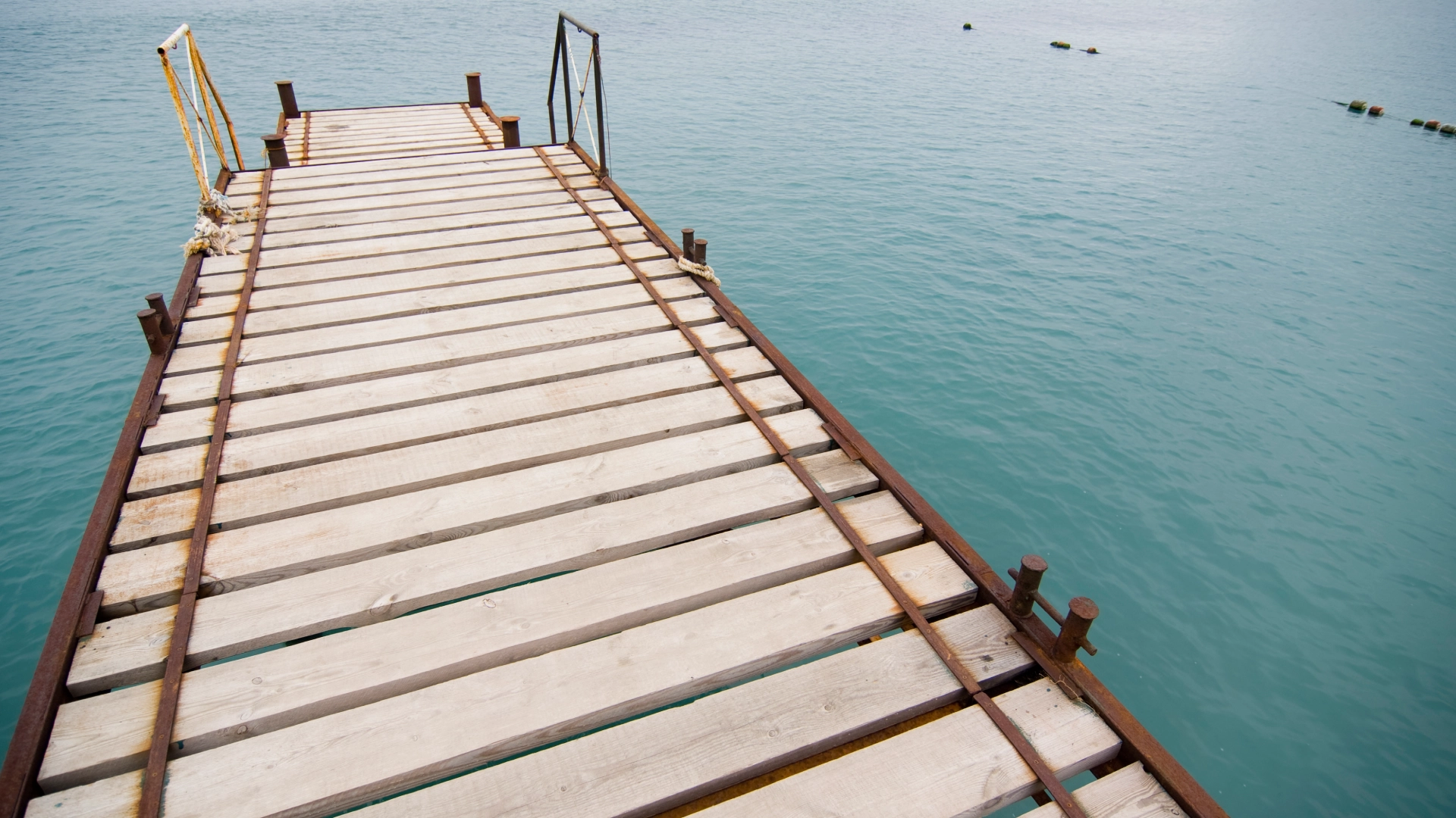wooden-dock-repair-featuring-sea-on-the-background-in-seattle-wa
