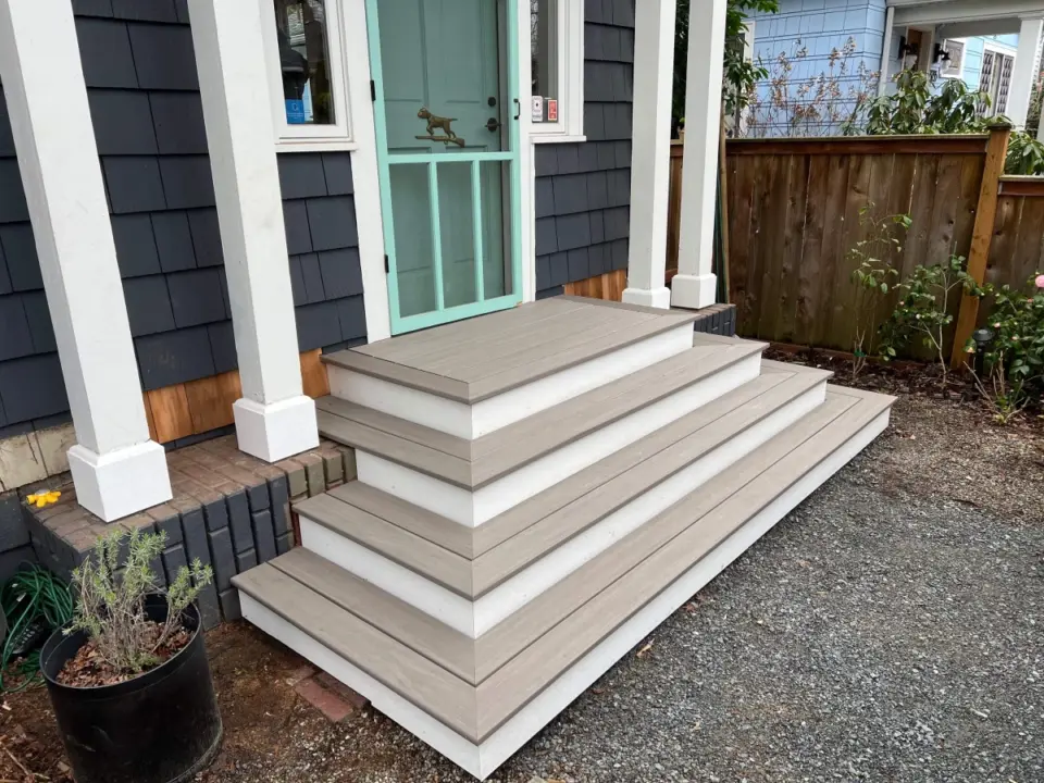 wooden-fence-beside-the-custom-residential-deck-stairs-and-portico-in-seattle-wa